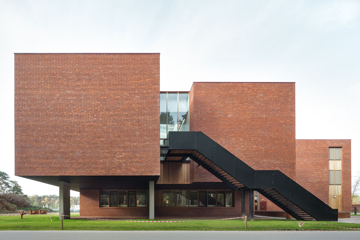 Red brick at one with the surrounding nature