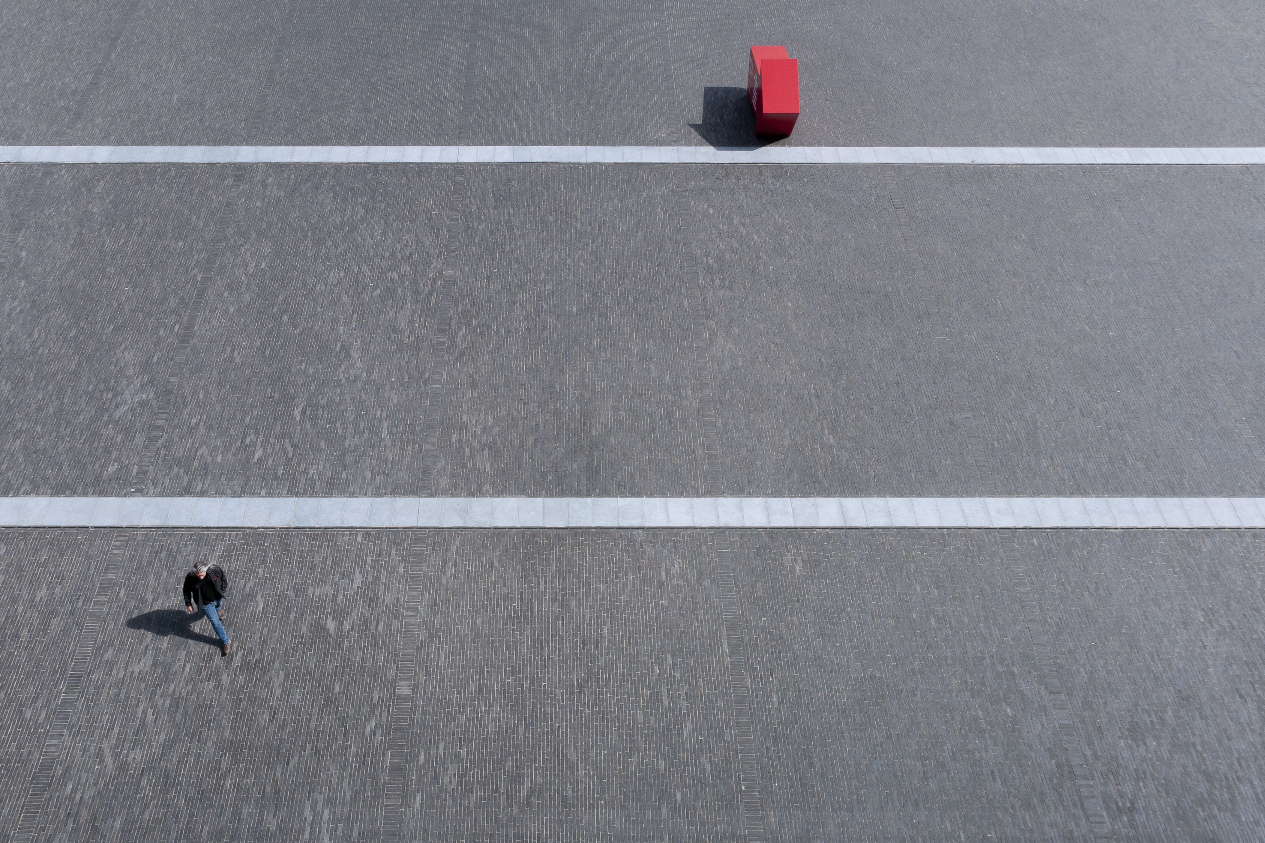 Unique appearance of dark Graphite clay paver dominates Tour & Taxis plaza