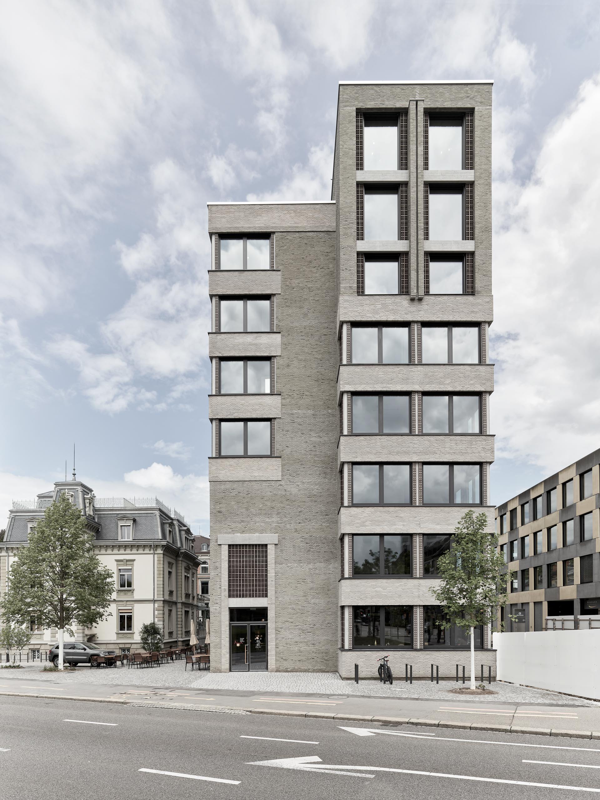 Seven-story modern structure in facing brick linea 7035 and 7036 complementing historical craftsmanship