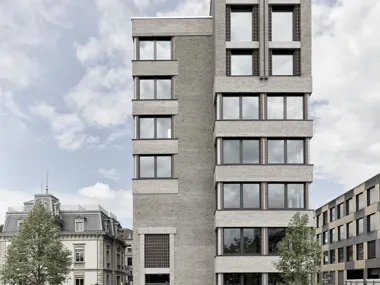 Seven-story modern structure in facing brick linea 7035 and 7036 complementing historical craftsmanship