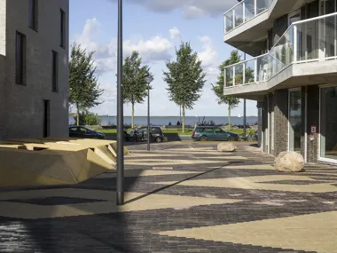 Contrasting pattern of SeptimA clay pavers bring colour to Kieke-Boe district square in Amsterdam